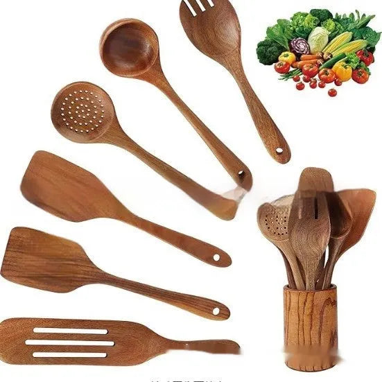 A set of seven wooden kitchen utensils including a spoon, a spatula, and several soup spoons laid out together.