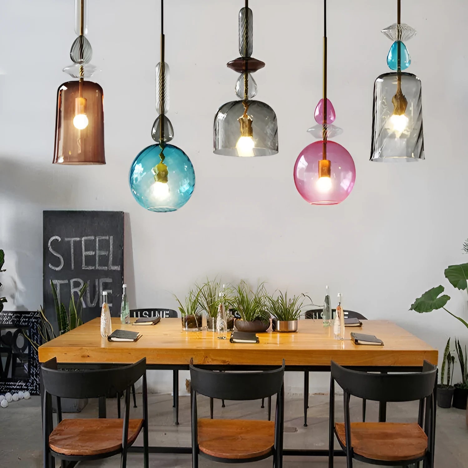 Glass chandelier with bar counter macarons candy design showing adjustable height mechanism