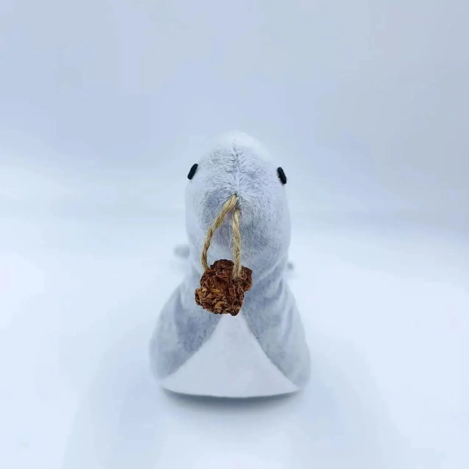 Blue sea lion plush cat toy with bell sound, catnip, and teeth grinding surfaces