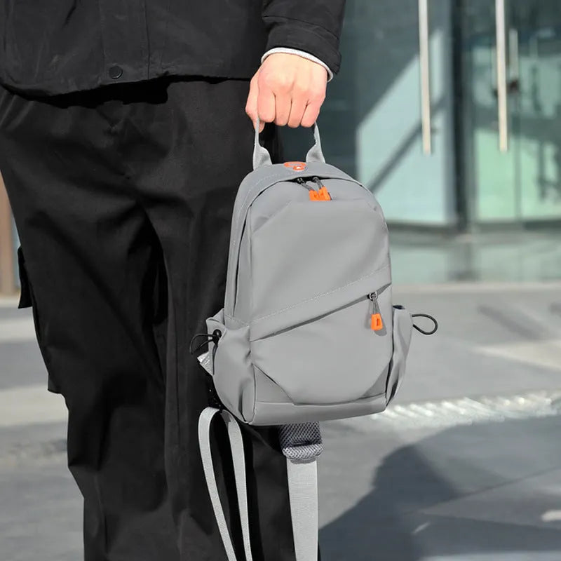 Mens casual single shoulder crossbody bag in polyester material, shown in black and grey colour options