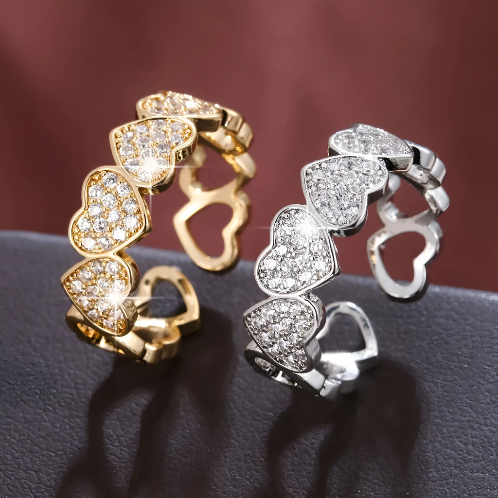 Adjustable couples opening ring with geometric heart design in gold and silver colour options