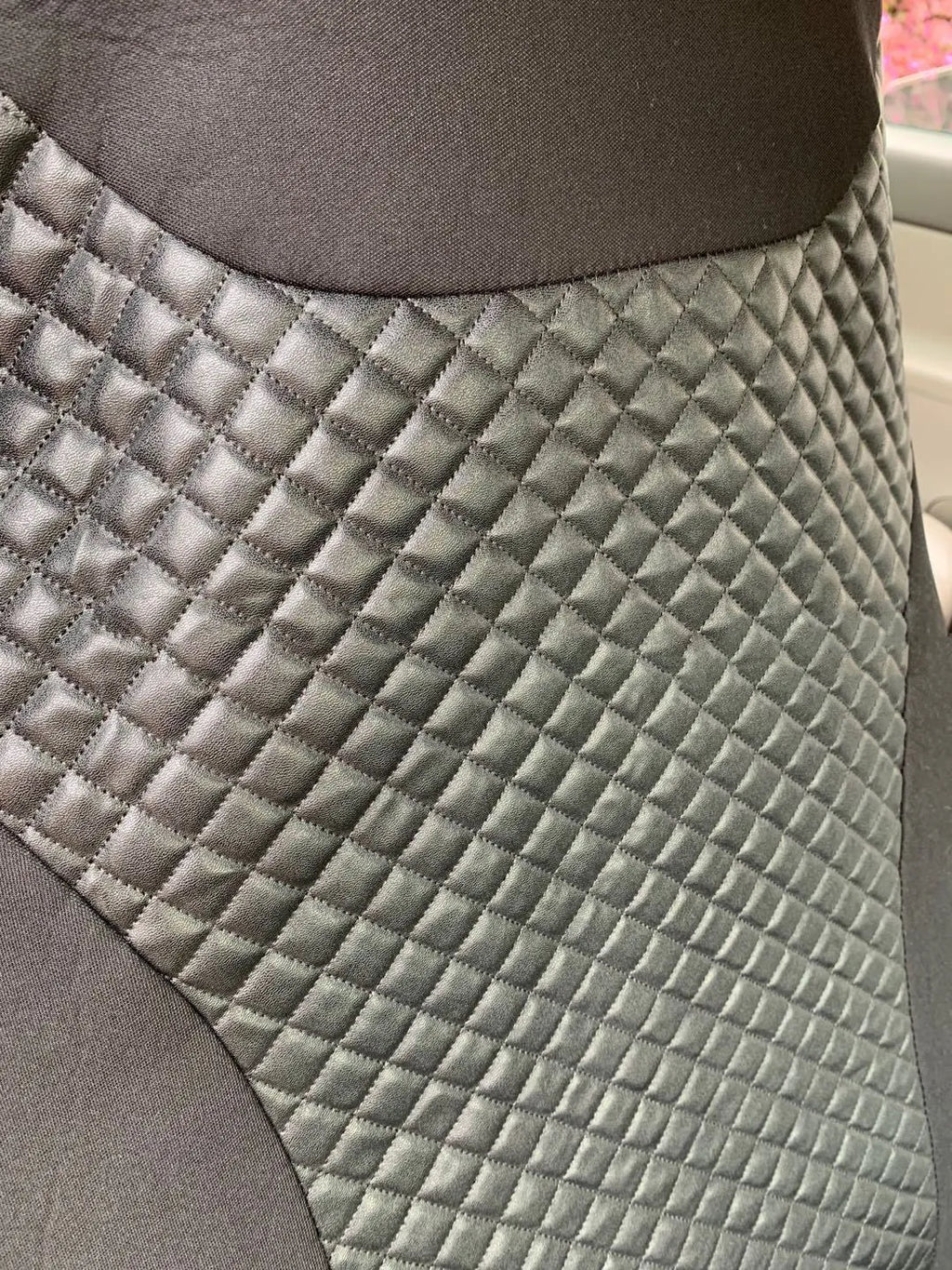 Black quilted automotive seat cover with PU and polyester fabric construction