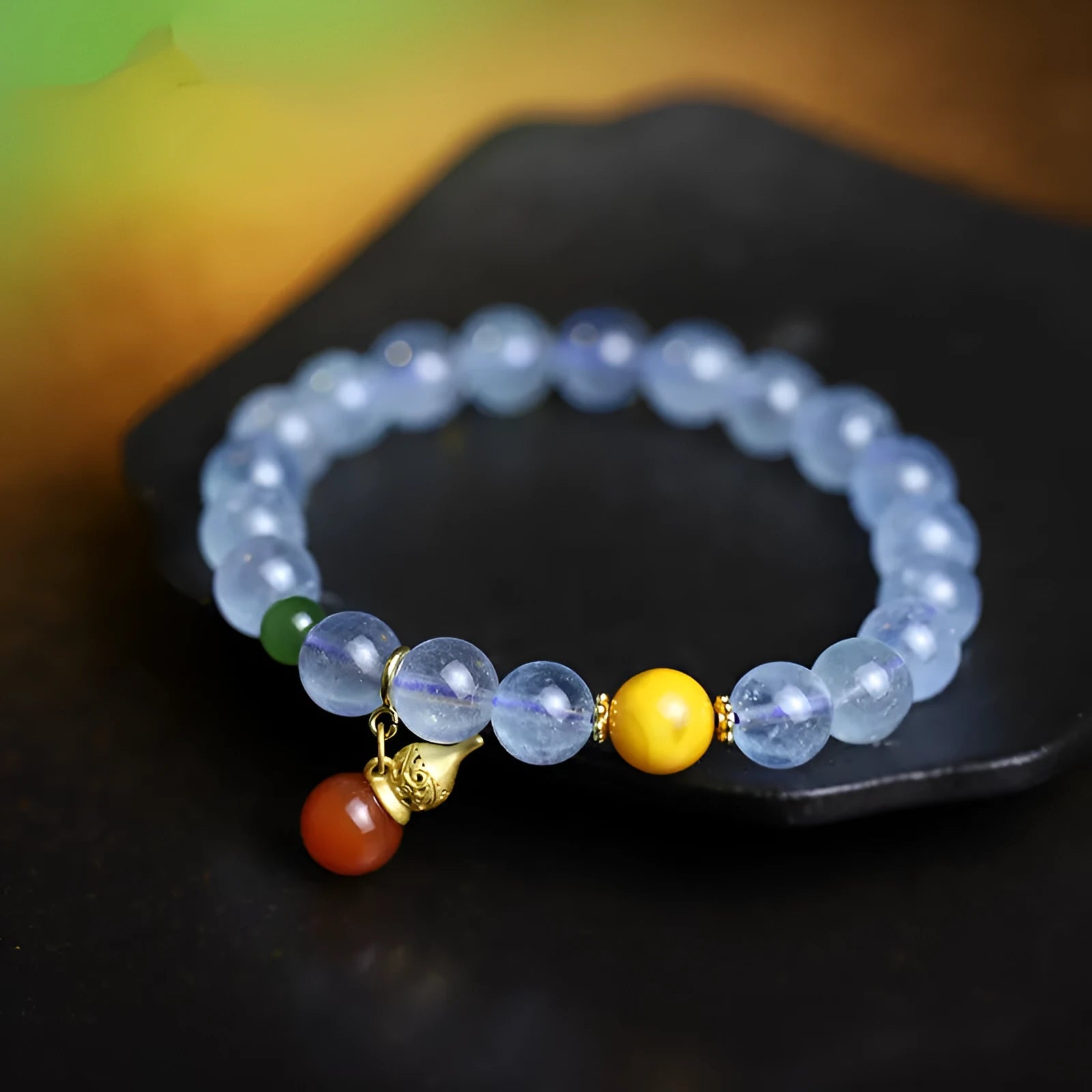 Women's aquamarine crystal bracelet with 8mm geometric beads in transparent iced blue colour