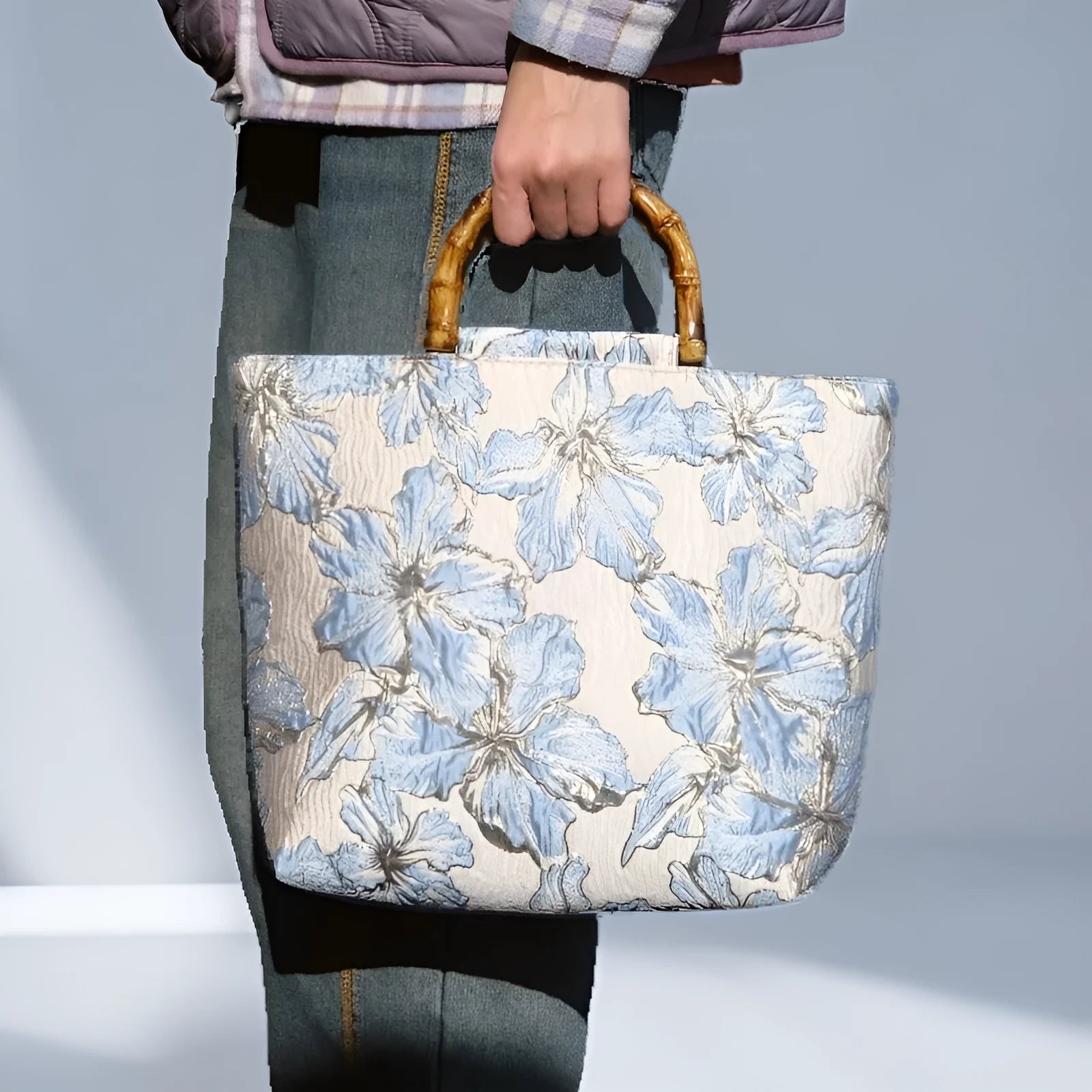 Women's light blue canvas bag with bronzing flower detailing and double shoulder straps