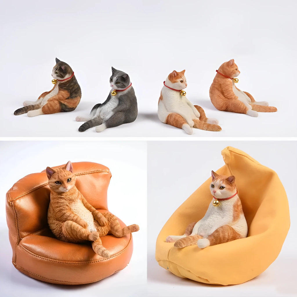 Small lazy cat figurine sitting on a sofa, a resin car dashboard ornament.