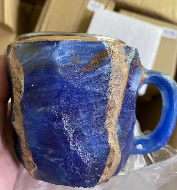 Purple resin mineral crystal coffee mug with handle showing 3D texture and 10cm height