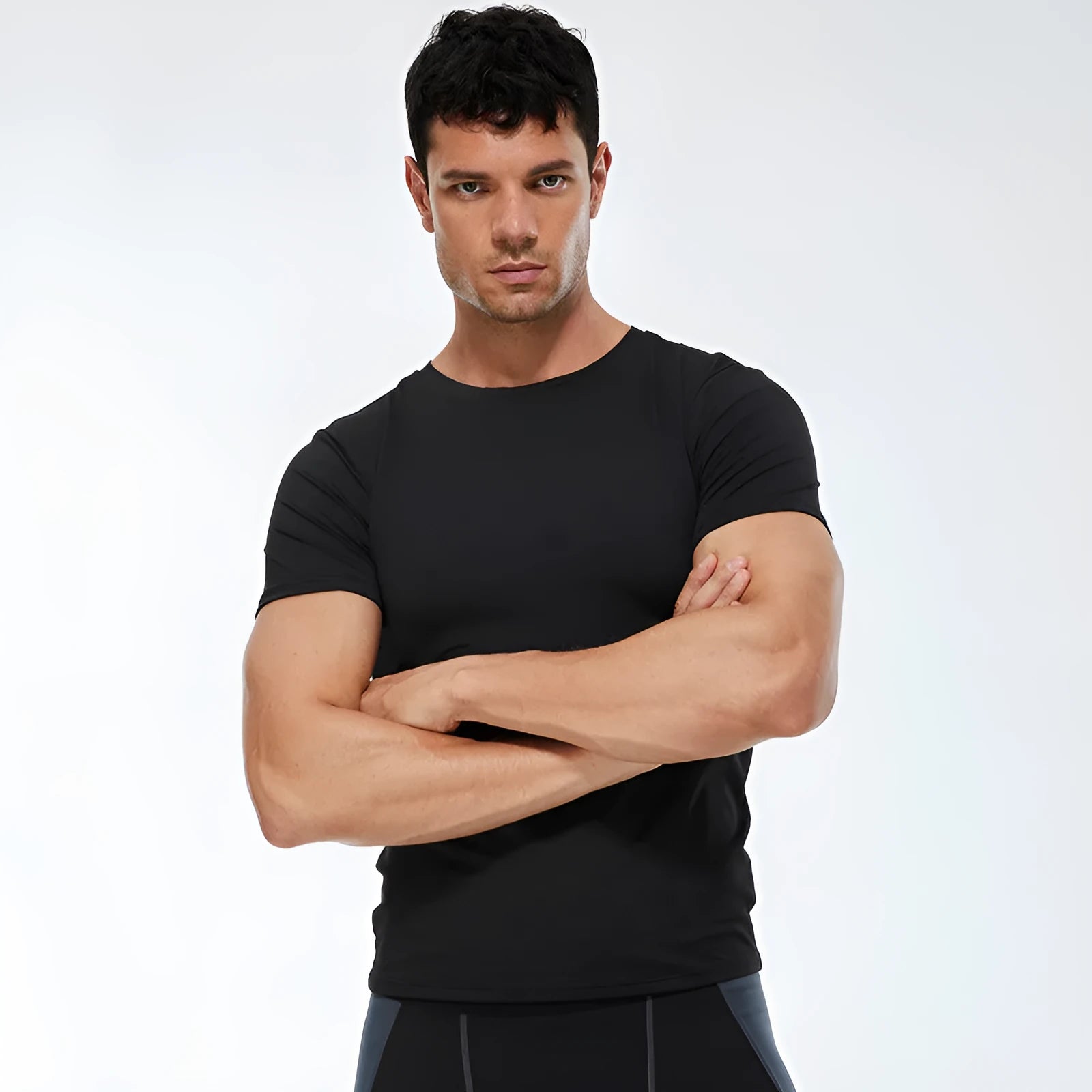 Men's solid colour stretch quick drying short-sleeved fitness shirt in polyester