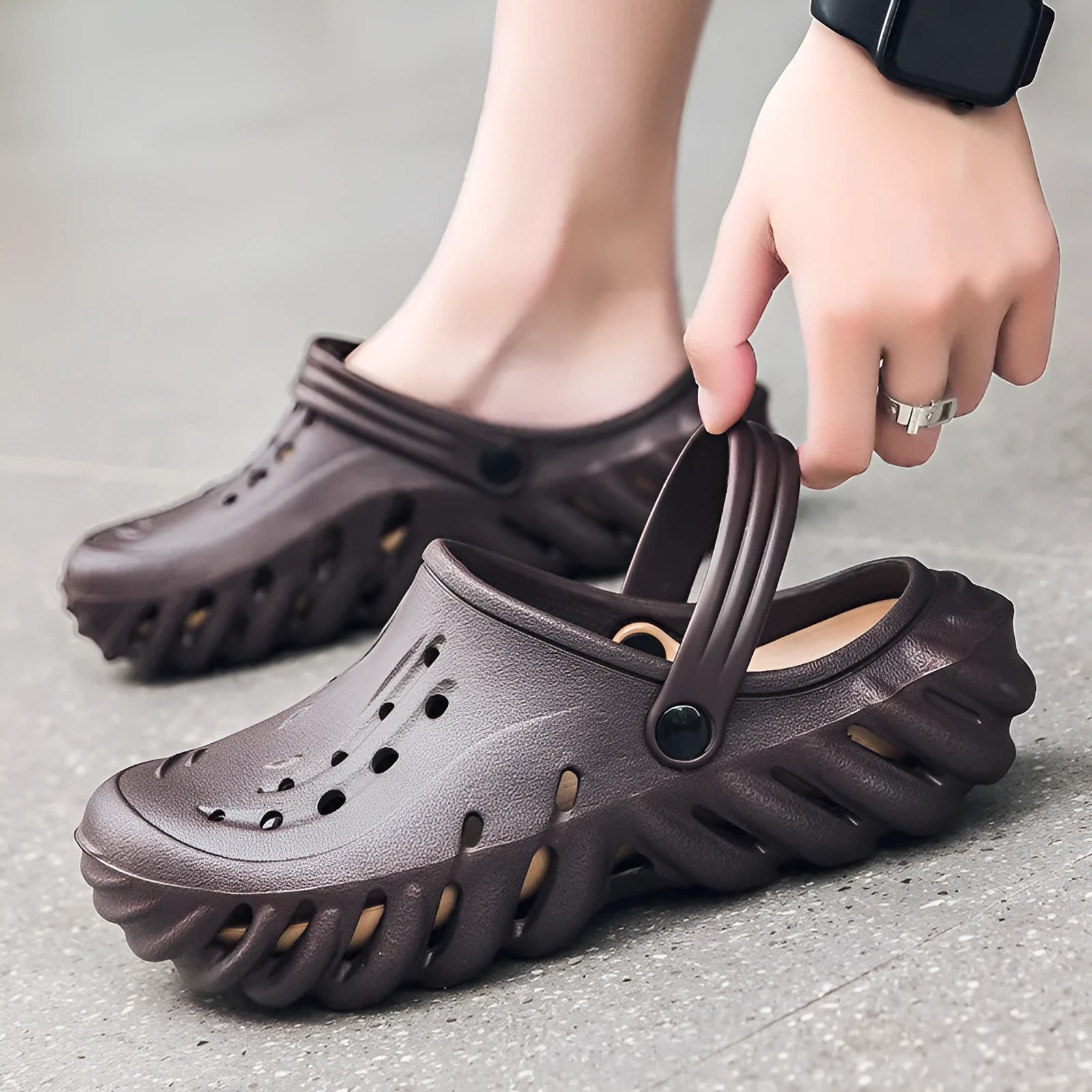 Men's beige EVA slipper sandals with hollow-out design and non-slip sole.