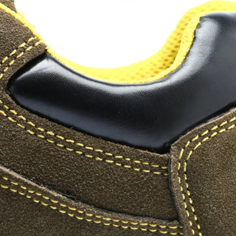 Bronze cow suede unisex safety work boots with a steel toe cap and patterned non-slip sole.