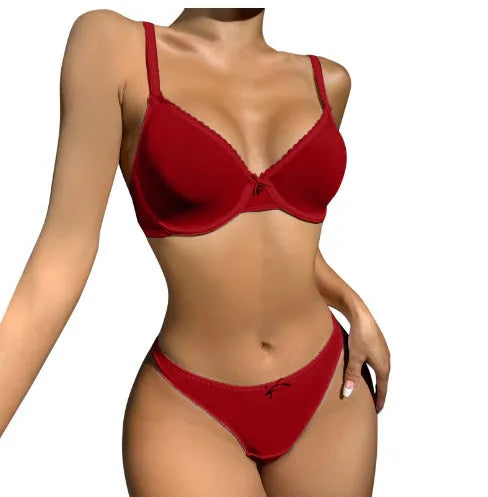 Women's lace underwear set showing bra top and knickers in coordinated three-point style design