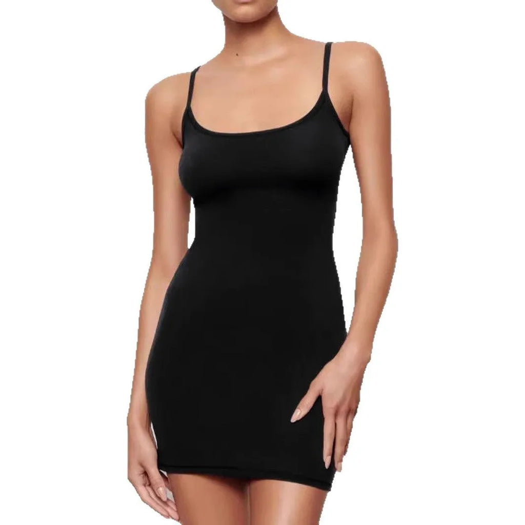 Black sleeveless sling style sheath dress with a slim fit and short mini skirt length.