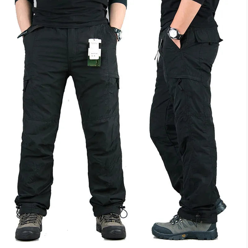 Men's thick cotton thermal overalls with wool lining in khaki colour, showing loose straight-leg fit.