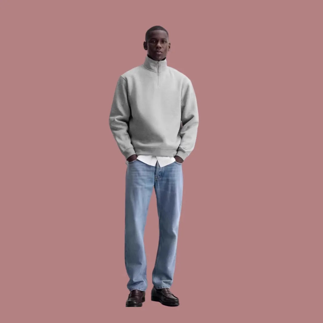 Grey cotton half zip stand collar sweater with long sleeves on mannequin
