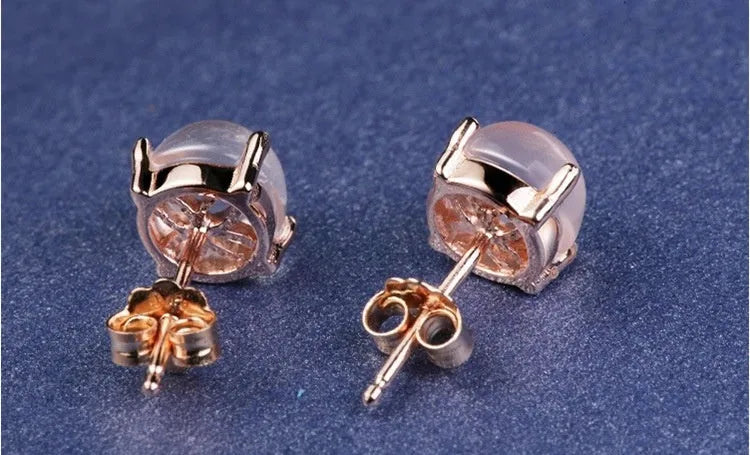 Women's Korean style rose gold quartz stud earrings with synthetic crystal inlay in drop shape