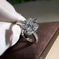 Women's moissanite four-prong princess cut ring in white gold colour on copper band, size no.7