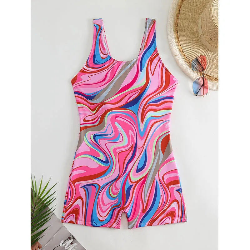 Women's printed one-piece swimsuit with high waist and backless design in polyester fabric.
