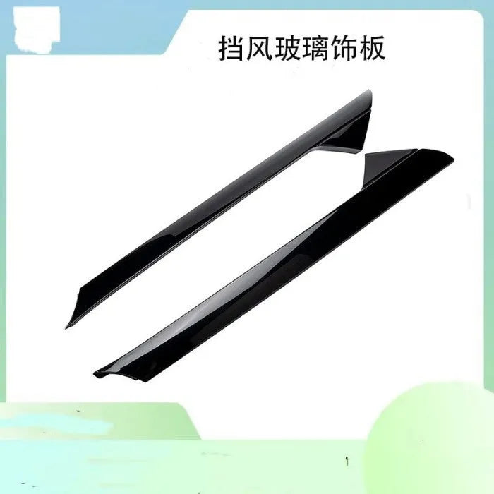 Gloss black Ford front windshield trim panel set with product codes BB5Z-7803144-AA and BB5Z-7803145-AA