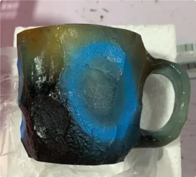 Purple resin mineral crystal coffee mug with handle showing 3D texture and 10cm height