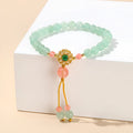 Green crystal Chinese bracelet with adjustable string on wrist