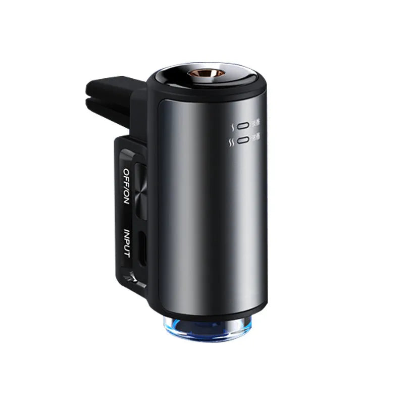 Smart car aroma diffuser clipped onto vehicle air vent in obsidian black colour