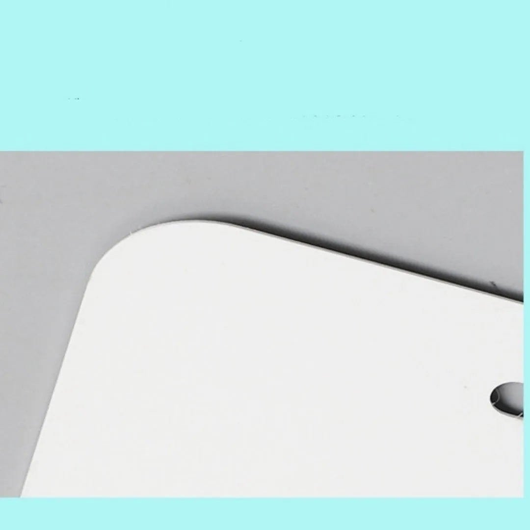 White rectangular aluminium licence plate blank with dimensions 30.3 by 15 centimetres.