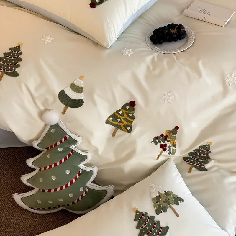 Pure cotton duvet cover and pillowcases with embroidered Christmas tree and floral pattern.