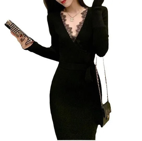 Black women's slim-fit woolen skirt in a princess dress style on a hanger.