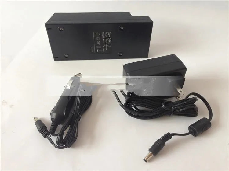A compact dual USB car charger for 12V and 24V vehicles with a cigarette lighter plug.