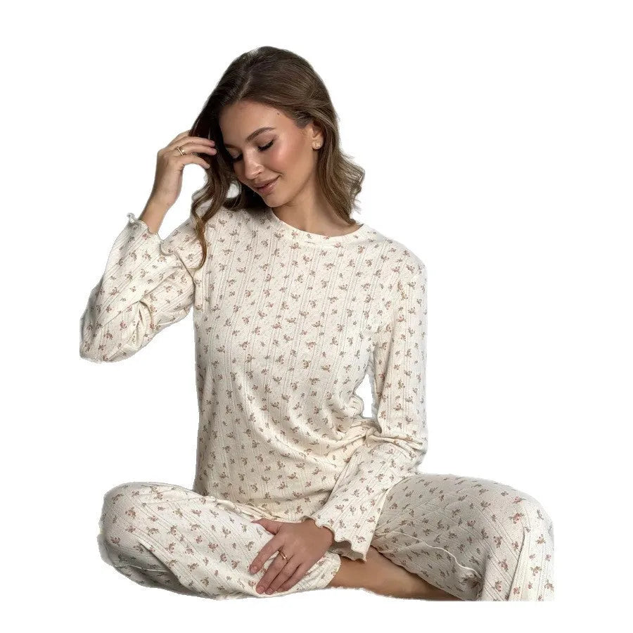 White floral print women's suit with long bell sleeve top and wide-leg trousers