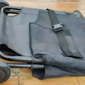 Black foldable aluminium alloy pet stretcher shown folded and unfolded, for large dog transport.