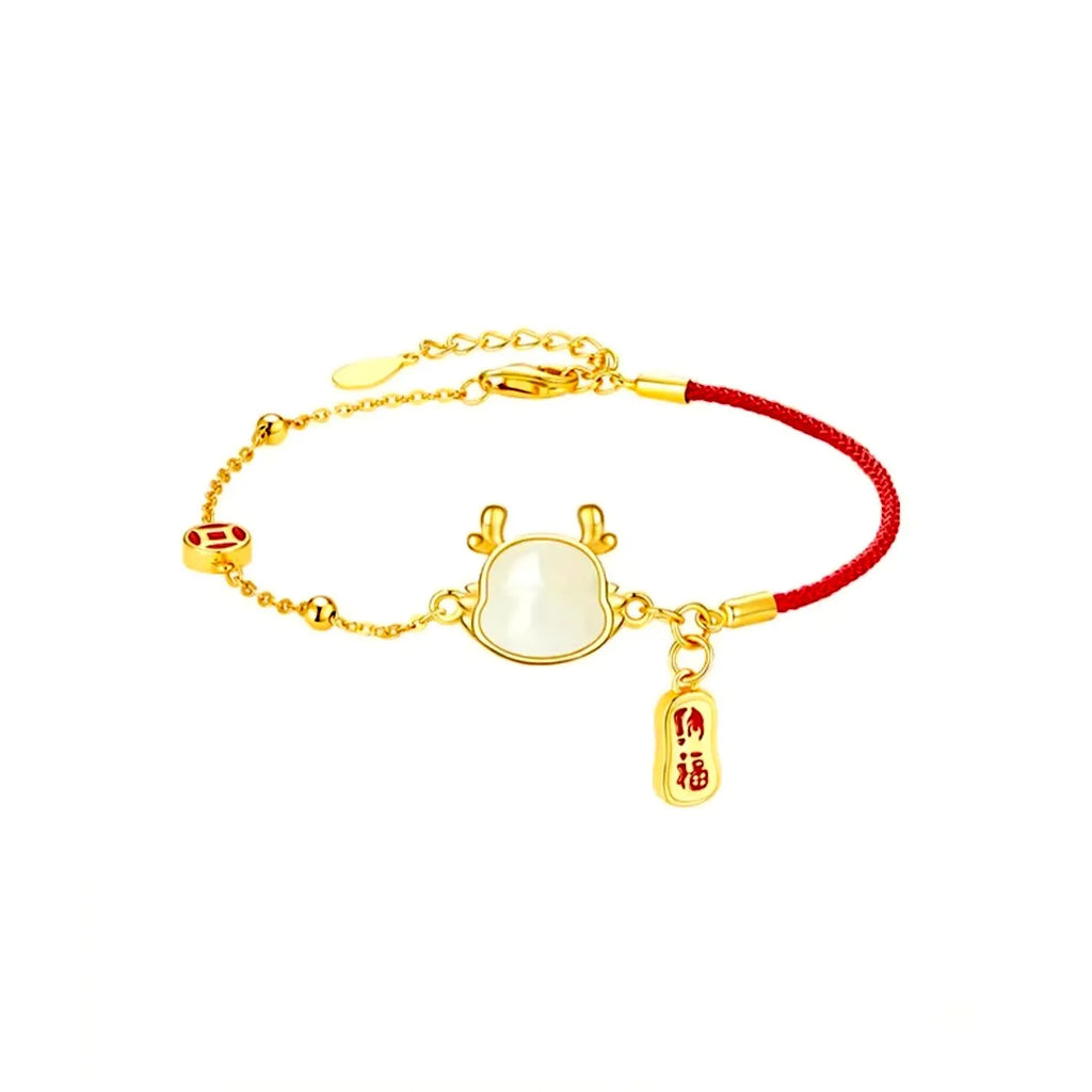 Women's silver-plated bracelet with Dragon zodiac motif and central Hetian jade stone.