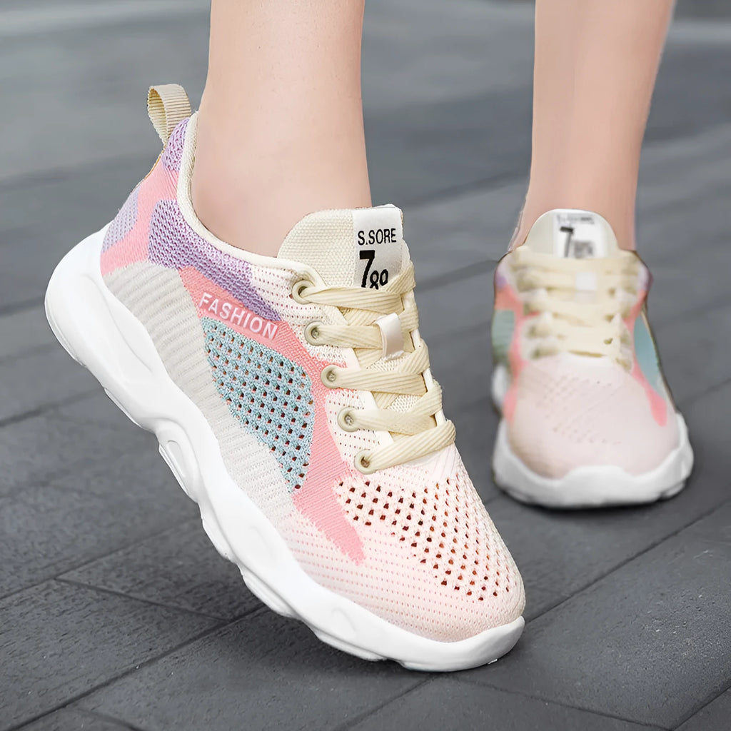 Casual colourblock lace-up sneakers for women with blue mesh upper, round toe, and white sole on a light background