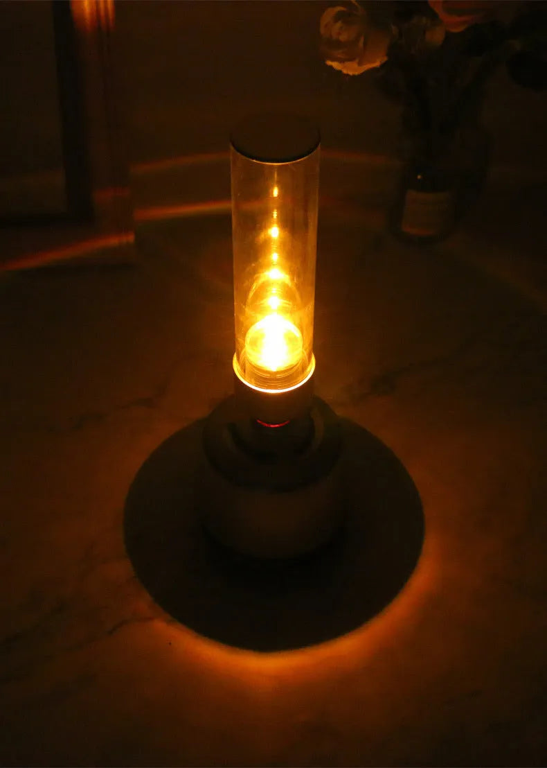 White silver modern candlelight Bluetooth speaker and night light on a surface, showing its upright 90x277mm design.