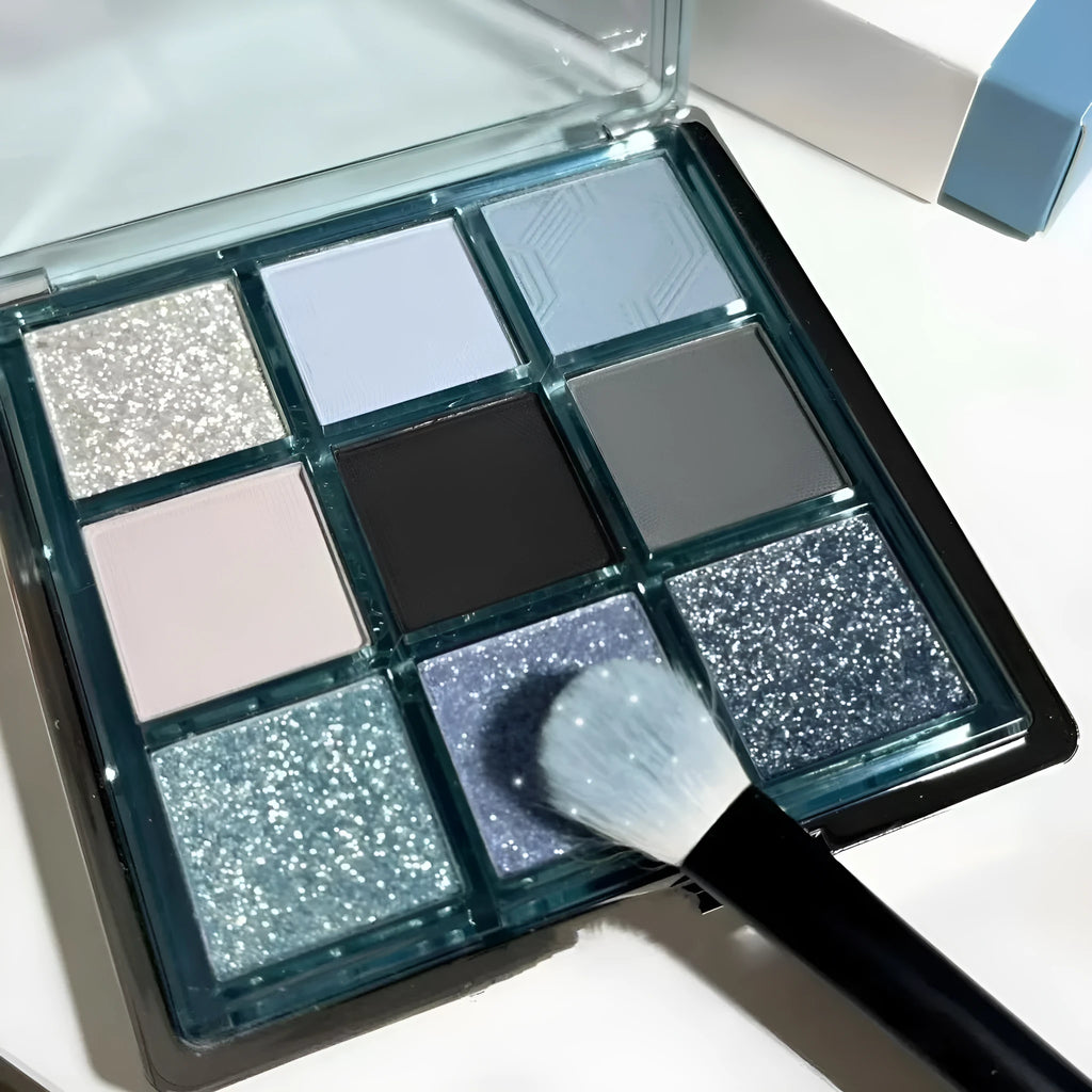 MUGELEEN nine-colour eye shadow palette showing matte, shimmer and diamond debris textures in cool tones