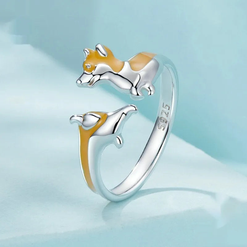 Sterling silver adjustable ring with a detailed cartoon Corgi design and electroplated finish.