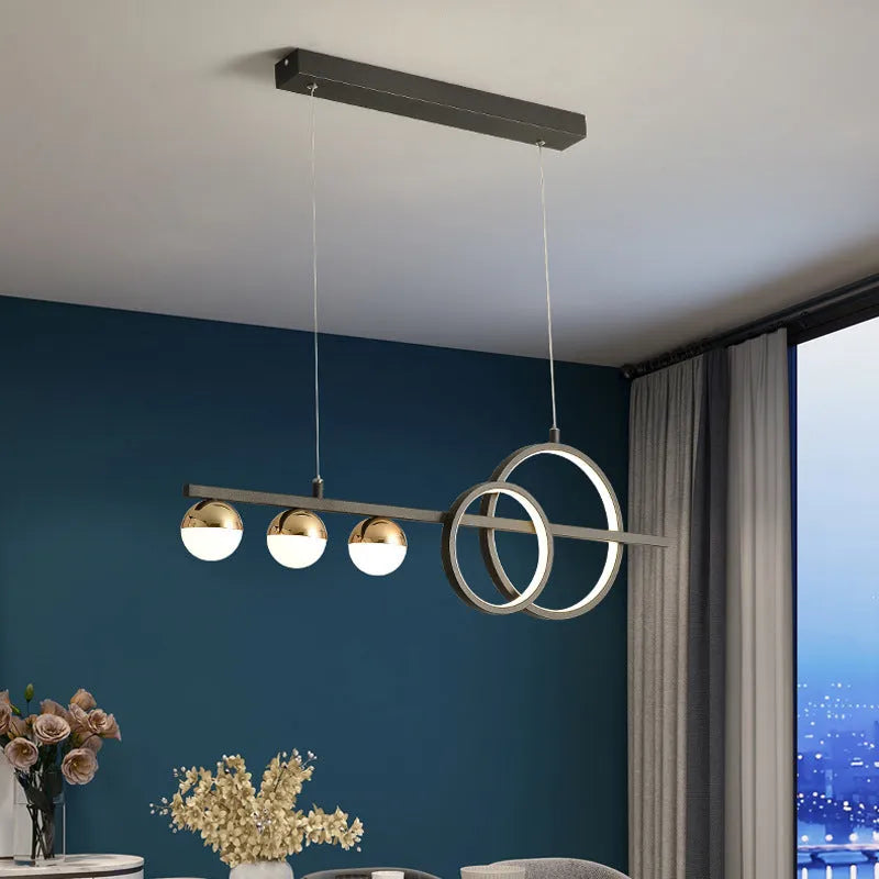 Rectangular black aluminium ceiling lamp with remote control for dimming.