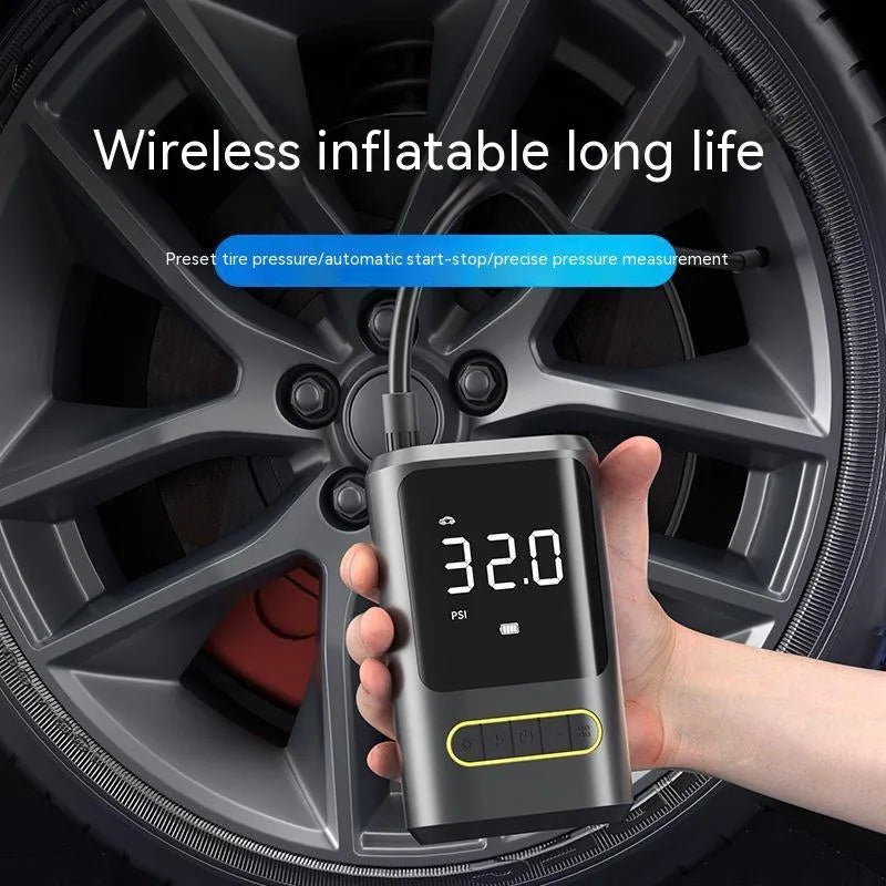 Handheld wireless air pump with digital display showing tyre pressure measurement