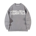 Loose geometric jacquard pullover knitted sweater in gray, front view, showing textured pattern and relaxed fit