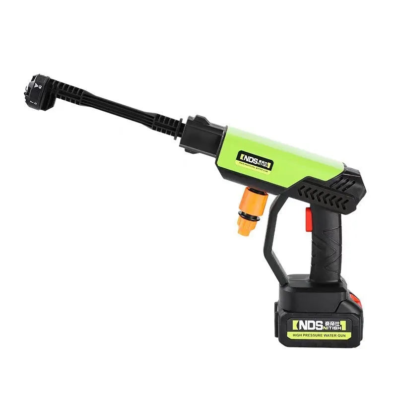 Green wireless high-pressure water gun with metal nozzle and battery pack, shown with foam pot and extension hose accessories.