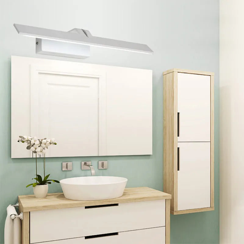 White wall-mounted LED mirror headlight with three-colour dimmable lighting above a bathroom mirror.