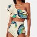 White women's one-shoulder bikini with lotus leaf detail and high-leg split bottom.