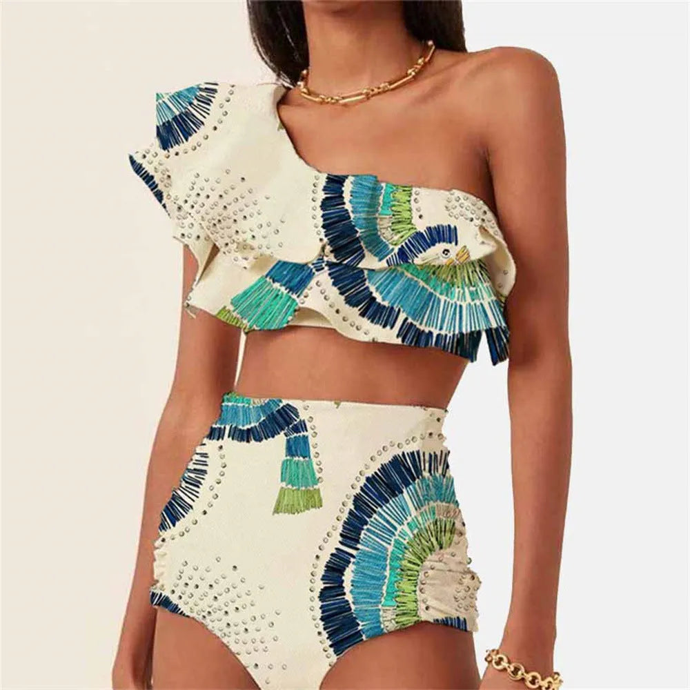 White women's one-shoulder bikini with lotus leaf detail and high-leg split bottom.
