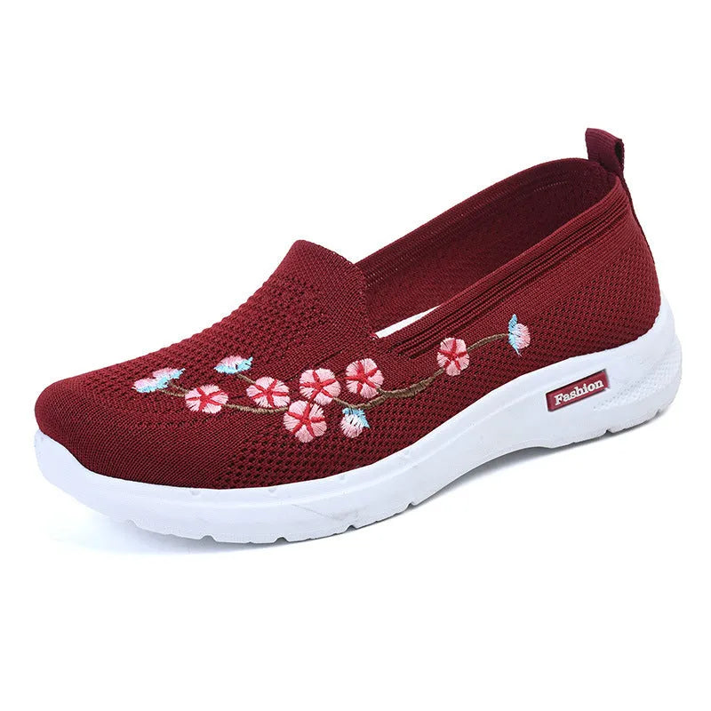 Women's wine red woven casual pumps with floral embroidery and a low anti-slip sole.