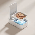 White pet automatic feeder with timer display and removable ice crystal cooling box underneath.
