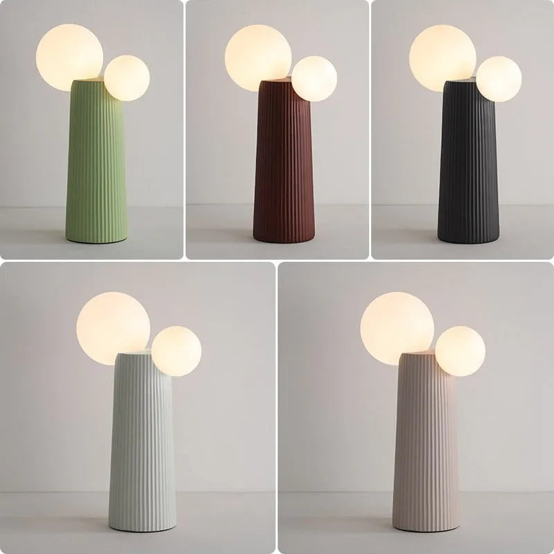 Modern minimalist cactus bedside lamp in milk coffee colour, resin and PE lampshade, 21cm diameter 40cm height, on bedside table