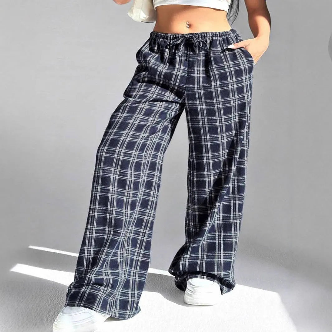 Women's casual trousers with drawstring waist and plaid pockets in red or blue colours