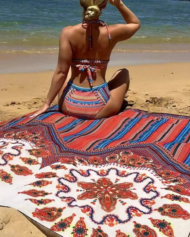 Women's three-piece swimsuit set showing cutout sleeveless blouse, high-waisted briefs, and matching swim coat