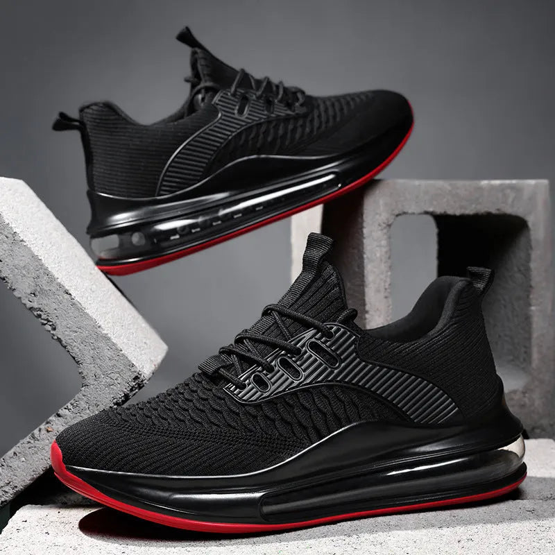 Men's black mesh running shoes with lace-up front and rubber sole on a white background