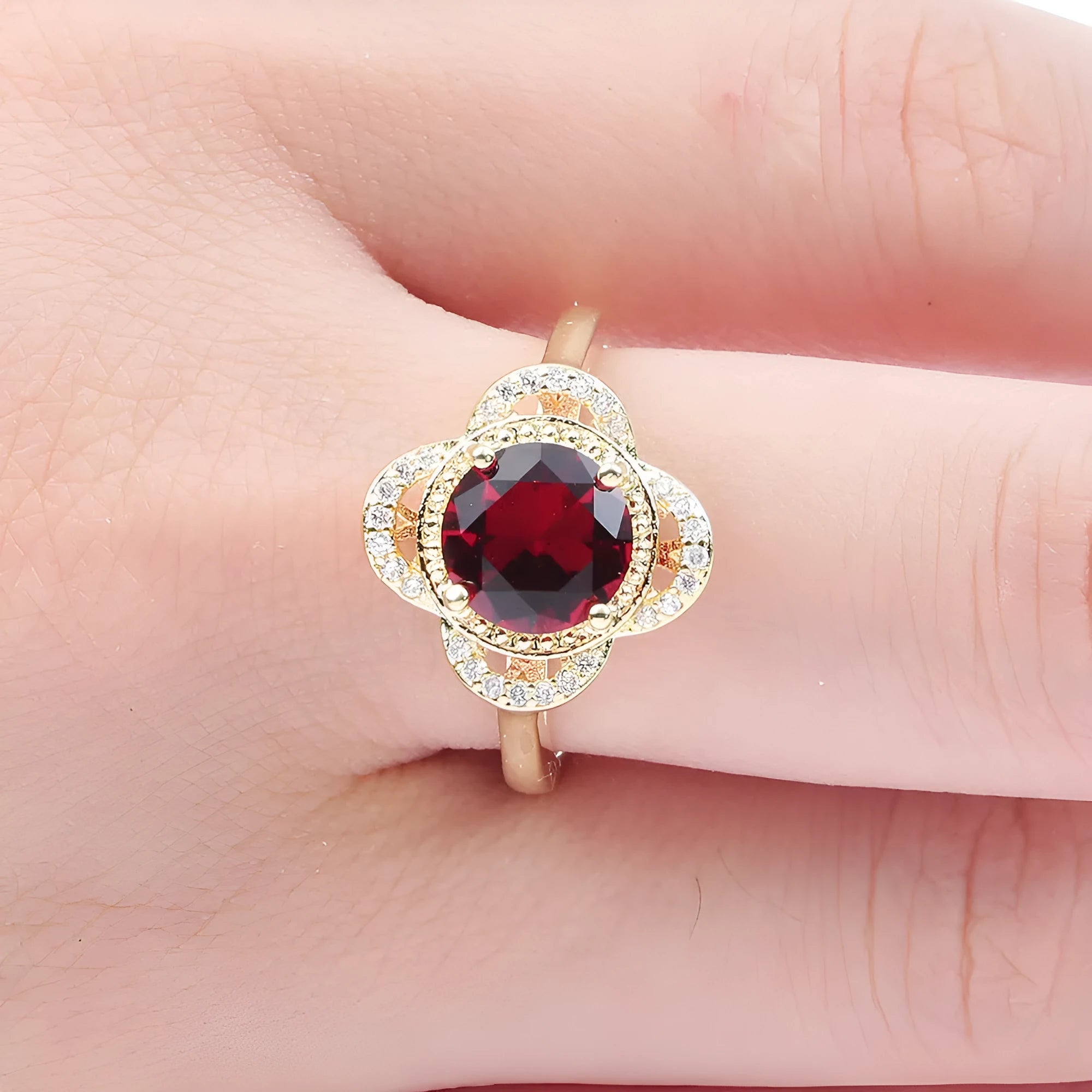 Copper fruit-shaped ring with inlaid zircon stone, shown in colour 10-6-1395.