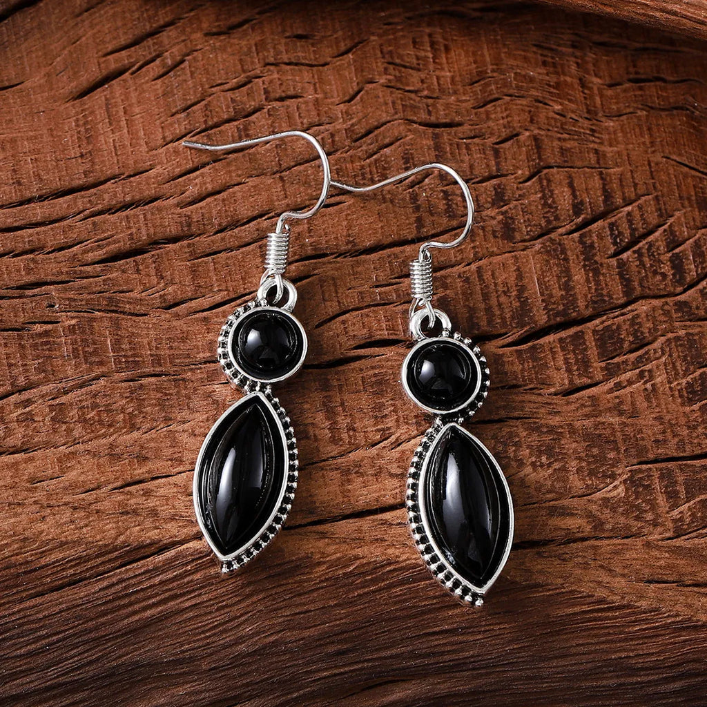 Vintage geometric pendant earrings in black and purple with bohemian retro style